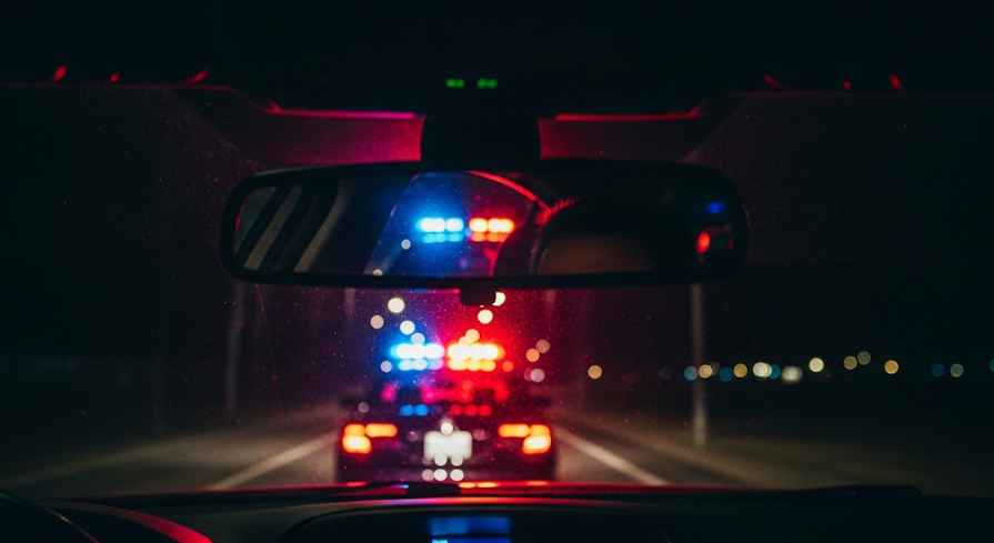view from police car pulling driver over